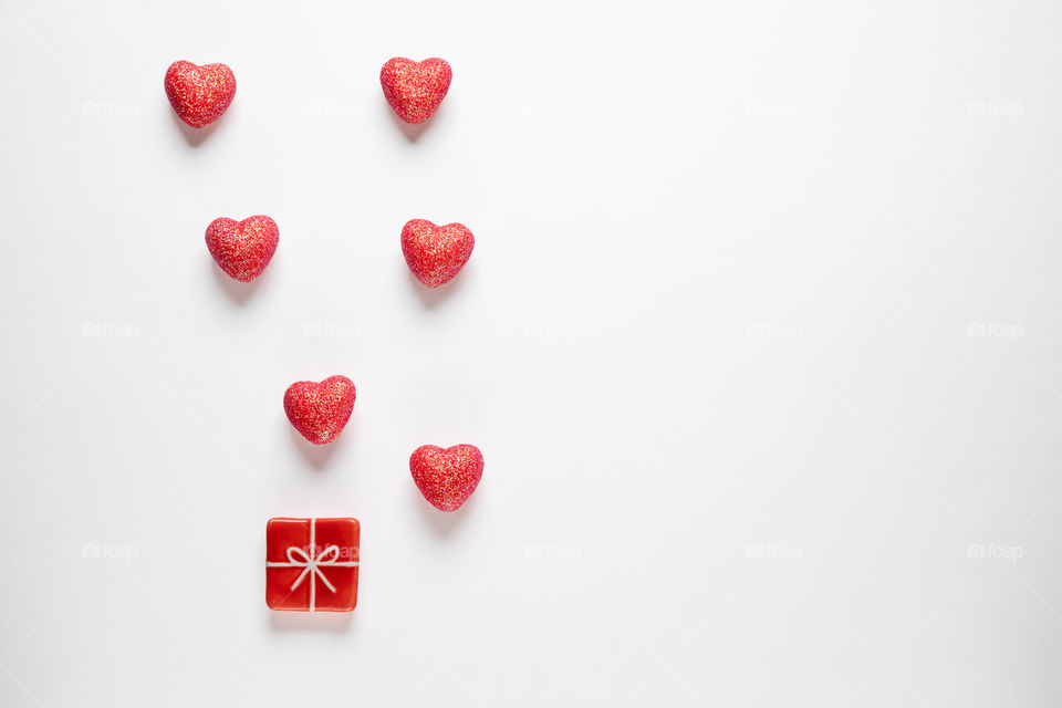 Red hearts on a white background. Valentine's Day.