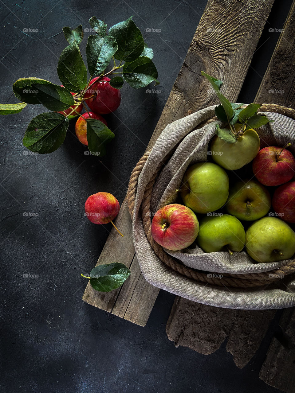 Apples on the wooden background 