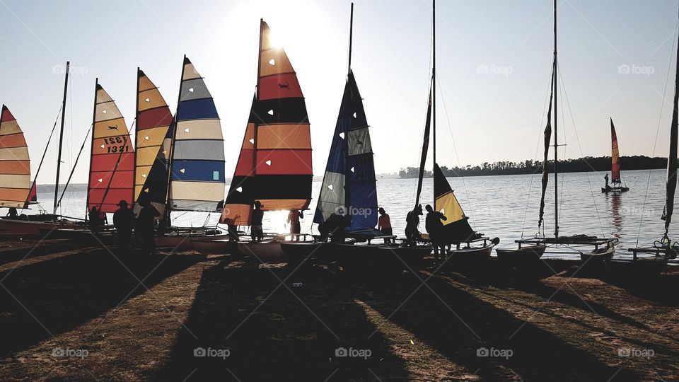 These are sail boats being used by a small South African group. The group is called the "Voortrekkers" by Afrikaans-speaking South Africans.