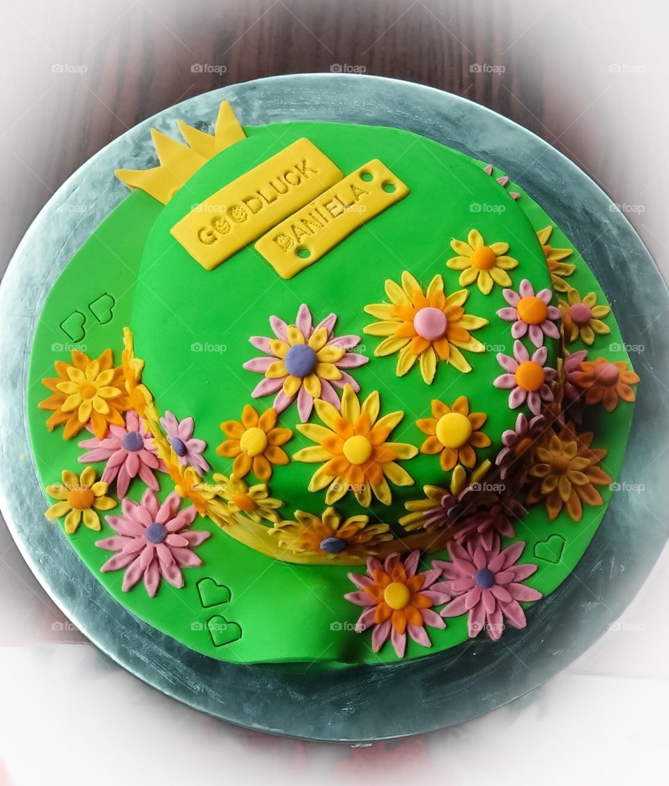 Beautiful floral goodbye cake with wonderful pastel fondant.