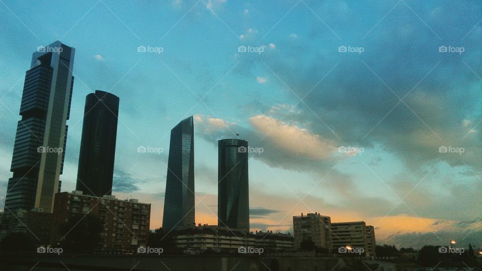 Madrid's 4 current skyscrapers - a fifth one projected to be built in the middle.