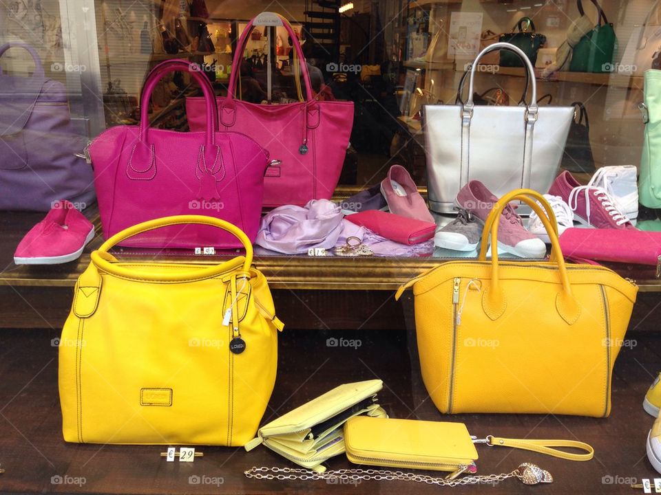 Shop window display with bags, shoes and purses