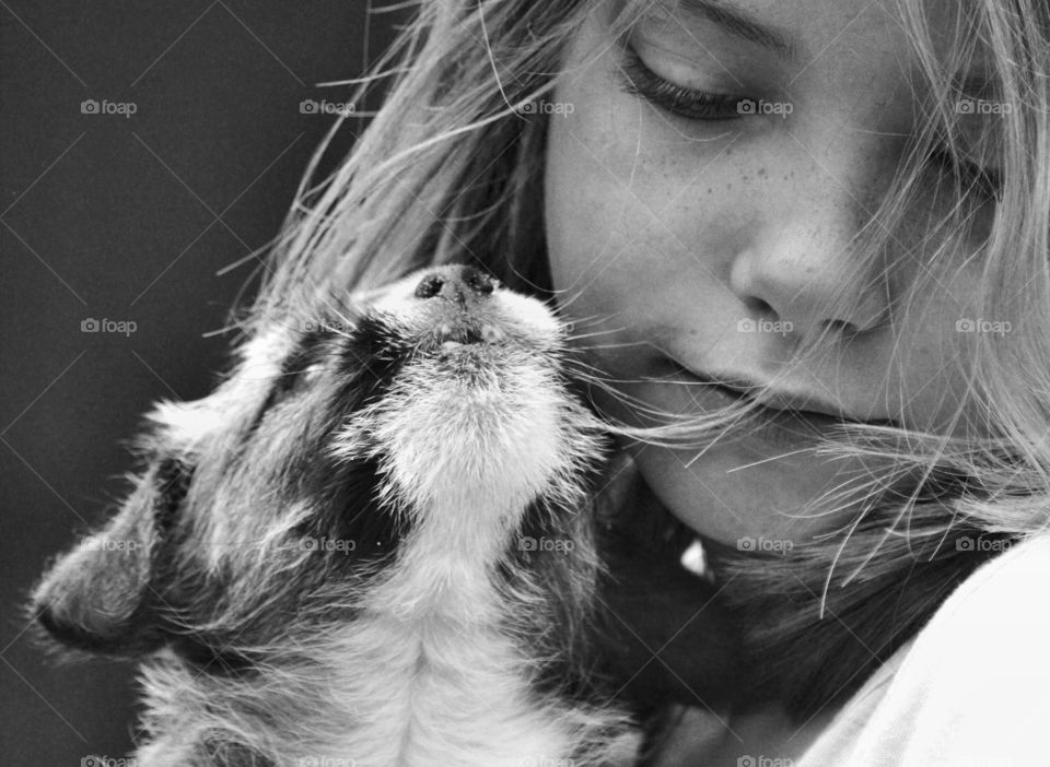 Close-up of a girl with kitten