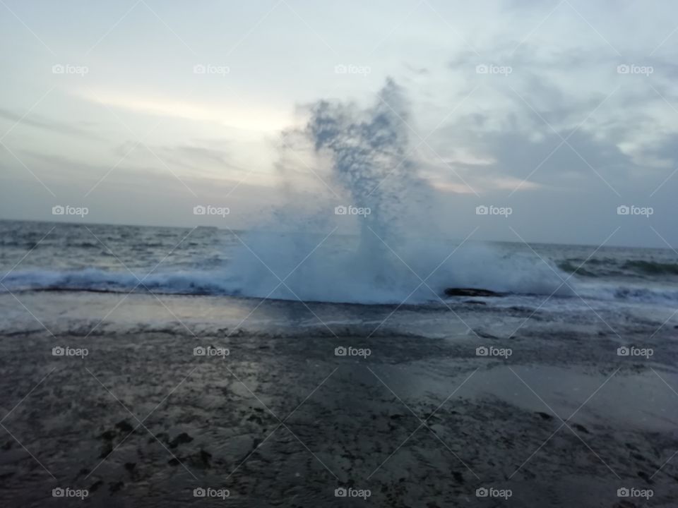 Sea water splashing on a evening