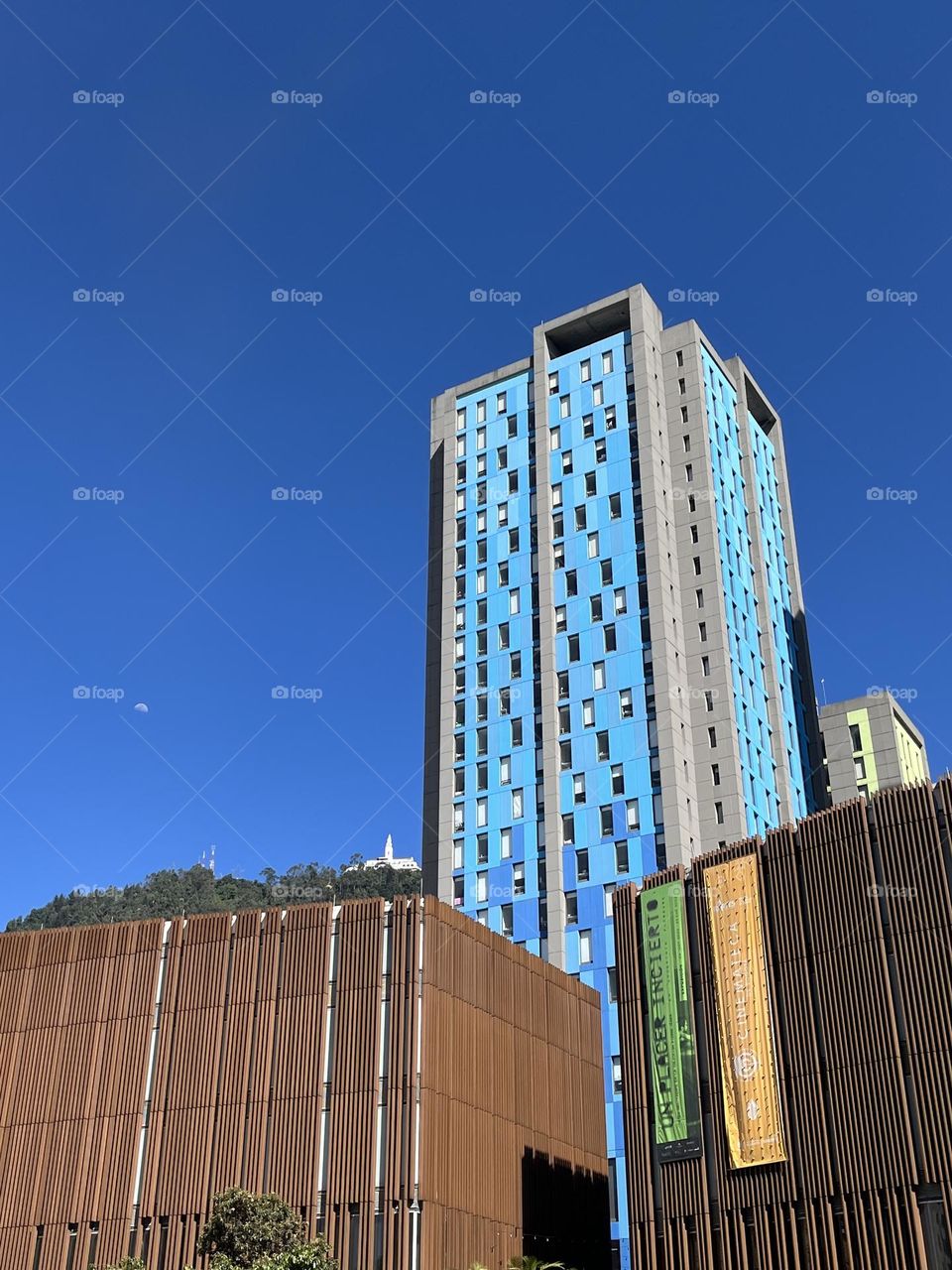 A view of the city  and the blue sky