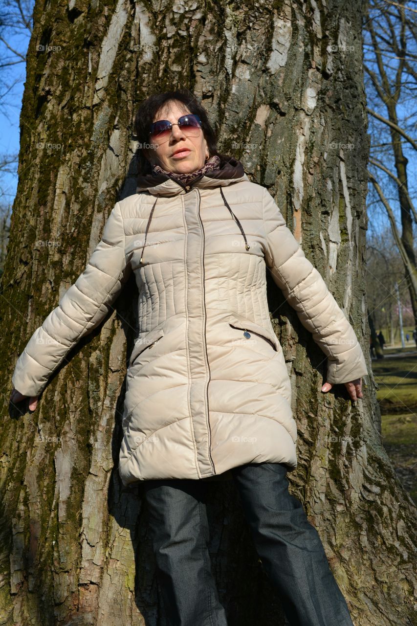 woman and old tree