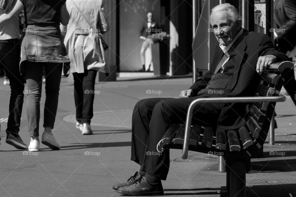 Old Man Sitting On Bench