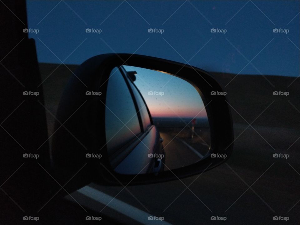 Sunset through the Rear-view Mirror