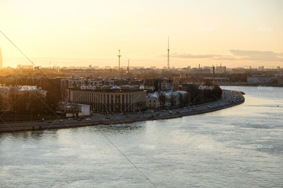 View of the city and the bend of the river at sunset