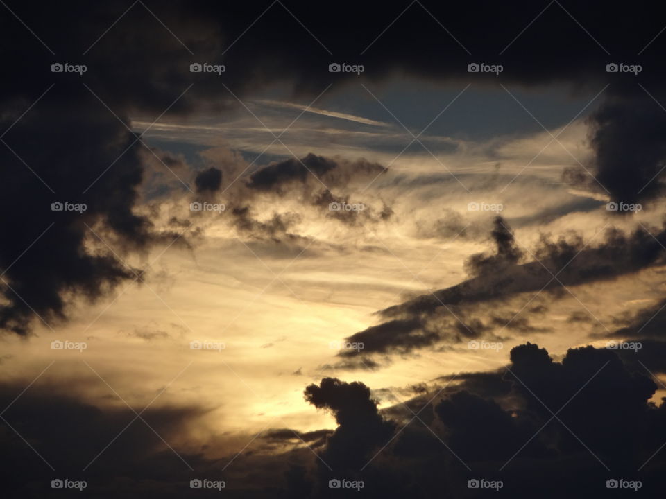 Golden Hour after rain. Golden Hour after the rain & the sun emerging from dark clouds