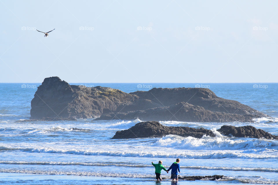 Kids enjoying Ruby beach in Washington