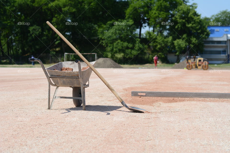 Shovel and a mortar cart on a construction site