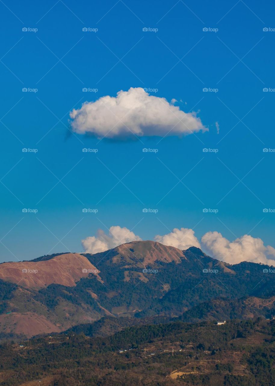 Cloud passing over mountain