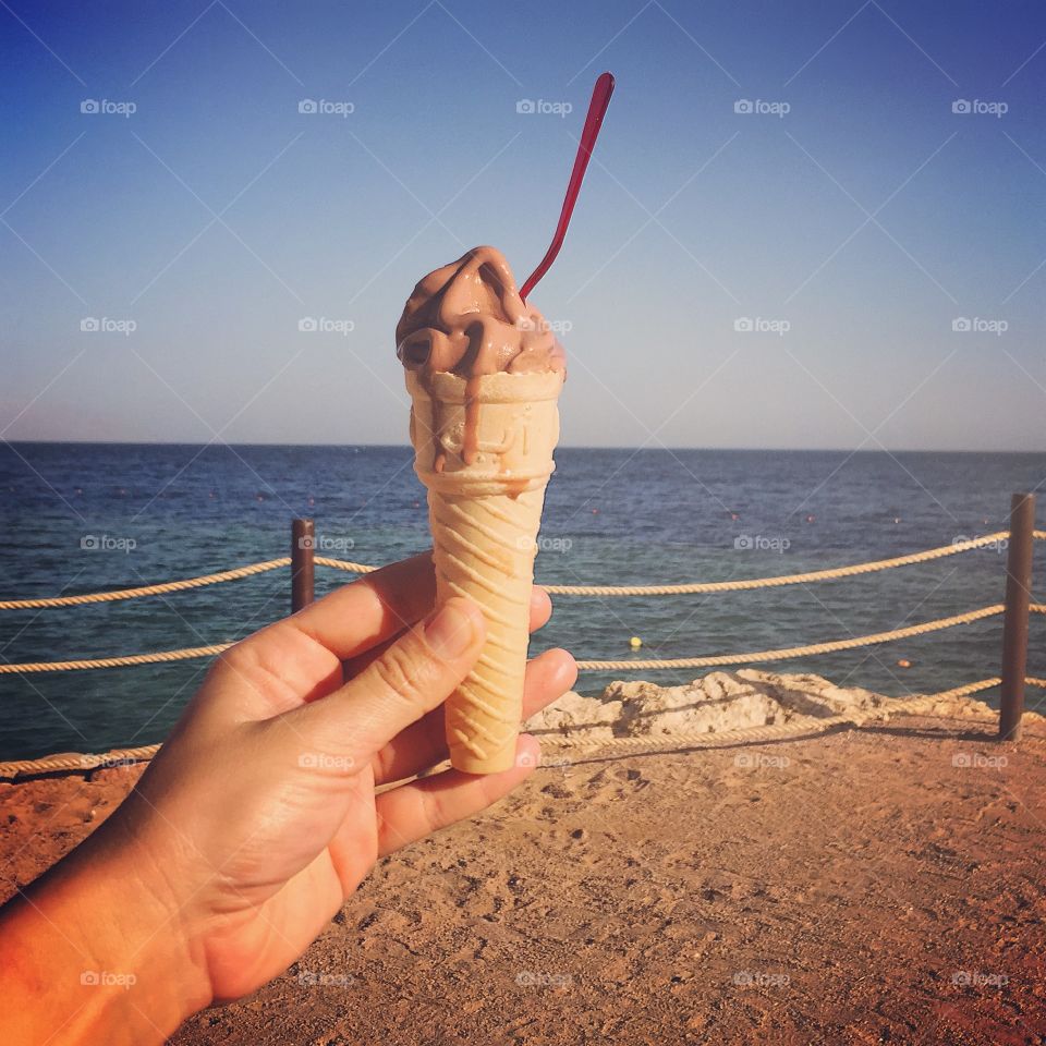 Hand holding ice-cream