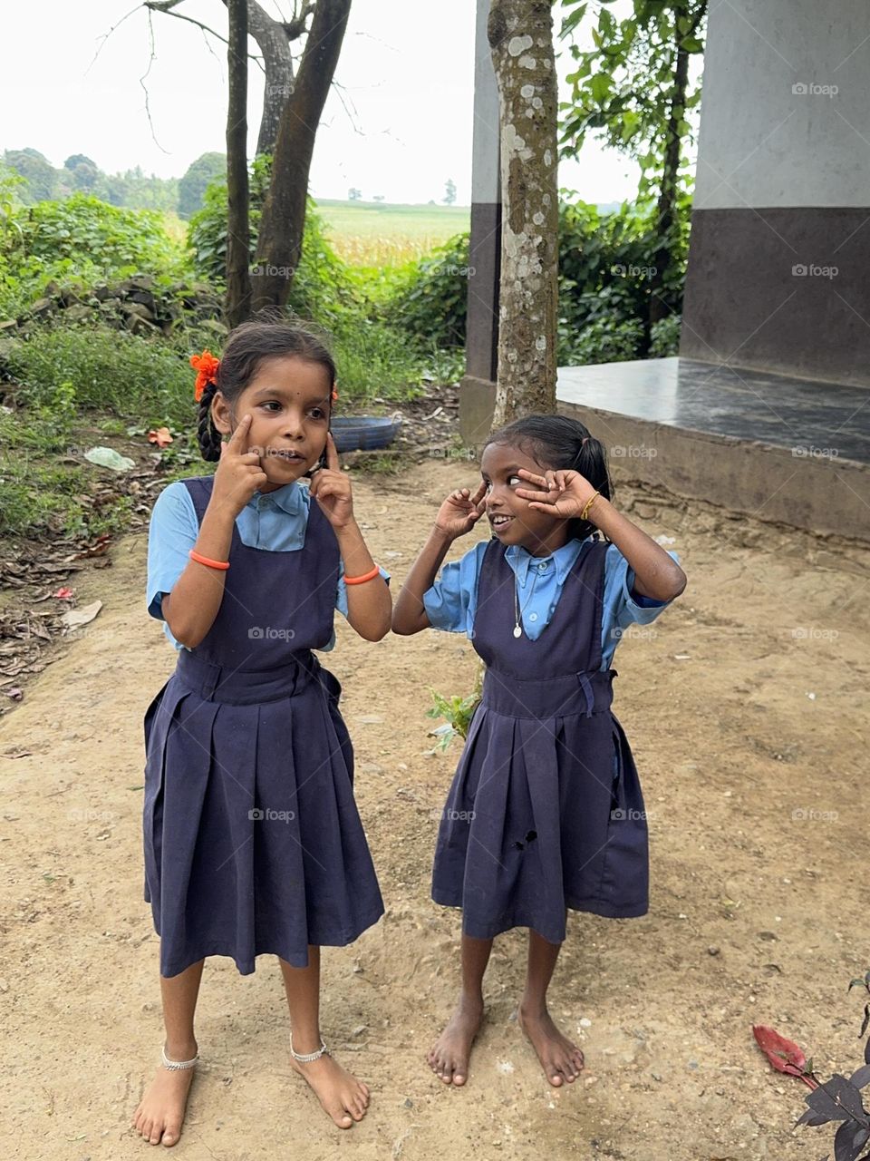 Girls dancing outdoors.