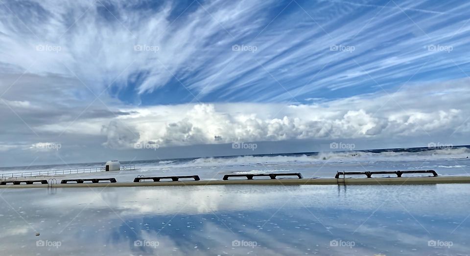 Beautiful clouds by the ocean