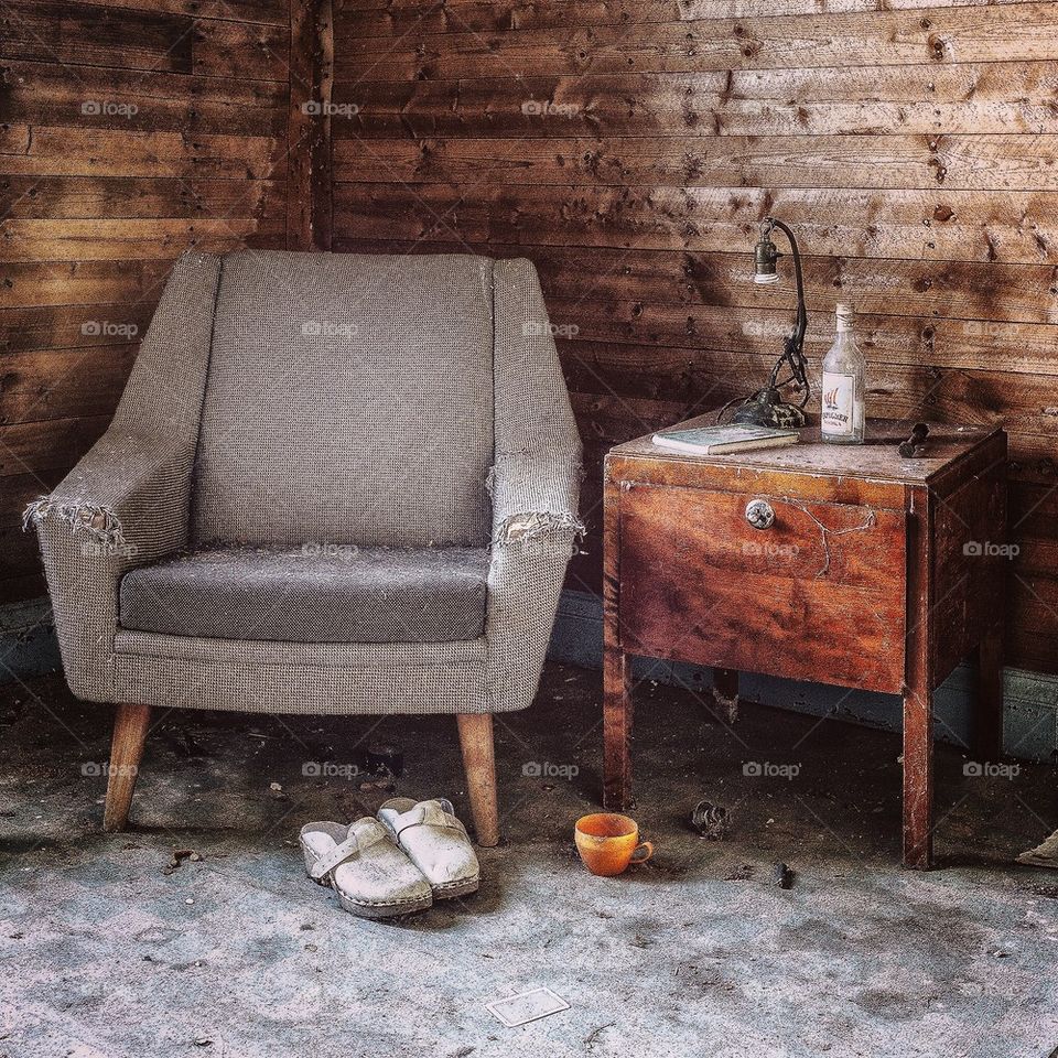 Empty chair in abandon room