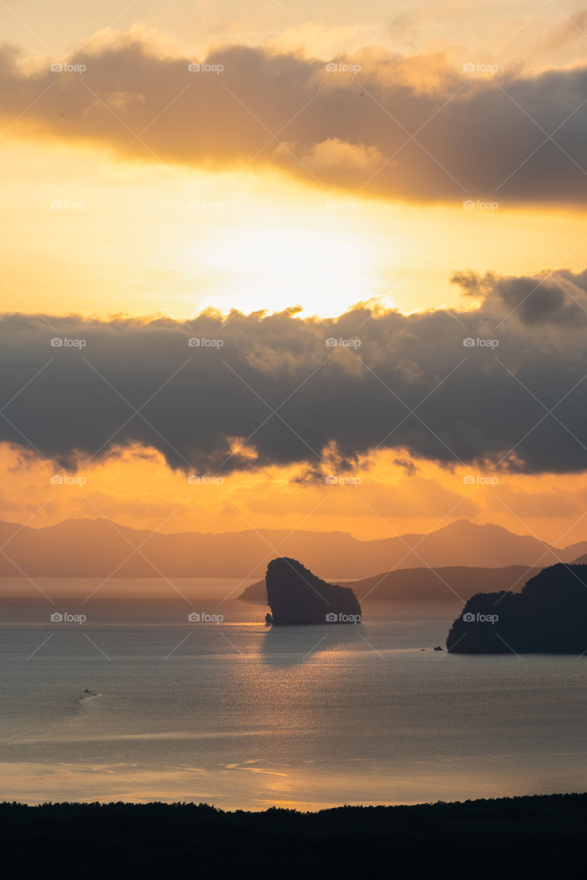 Beautiful sea scape of sunrise above the island in the southern of Thailand