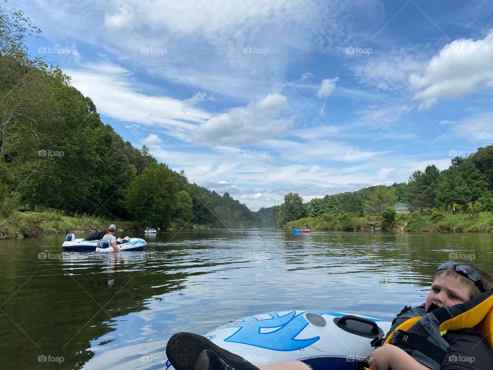 Tubing down the river