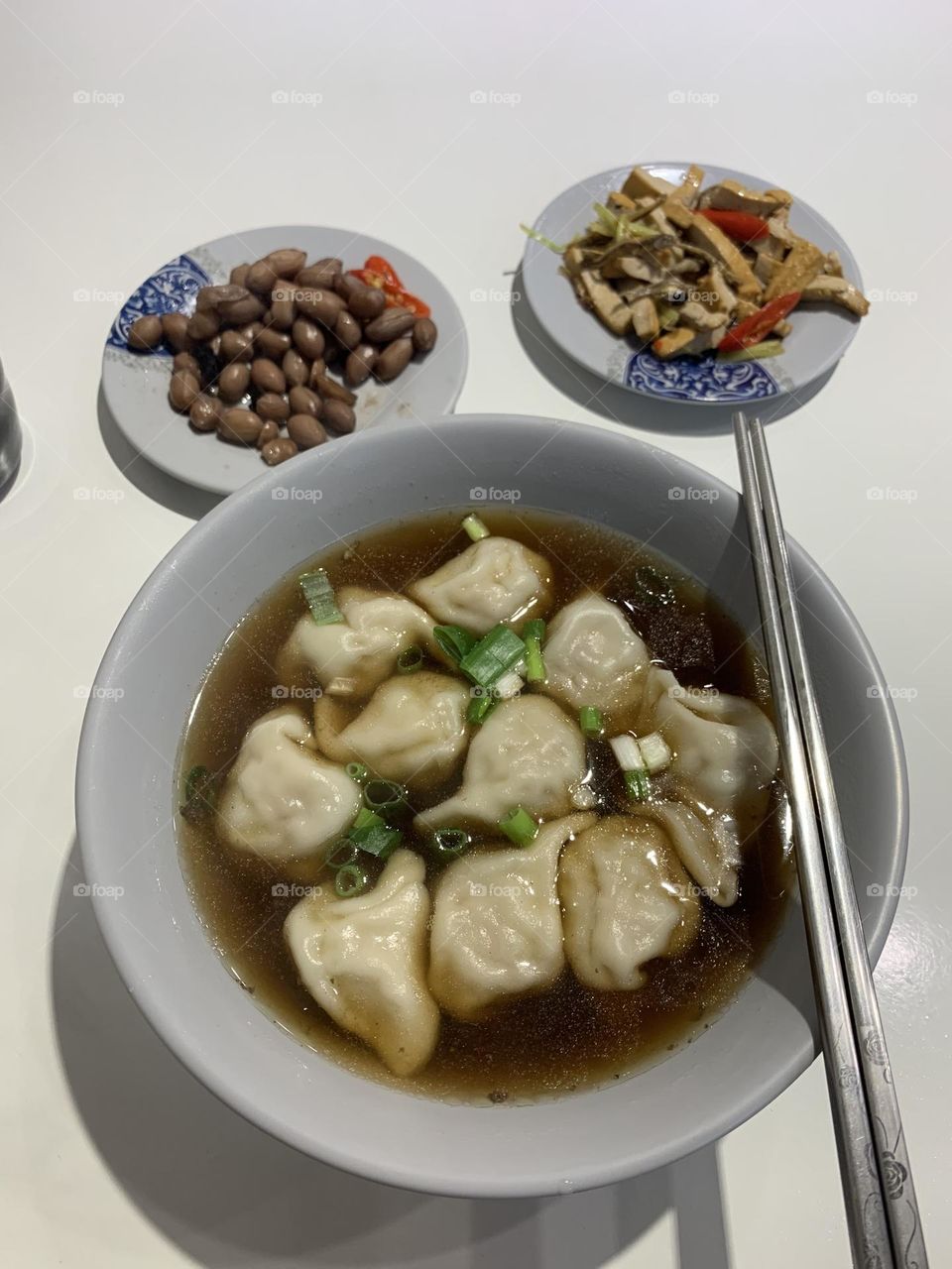 Dumplings soup and sides