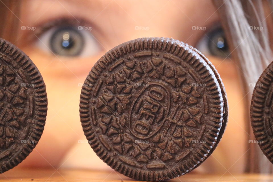 Yum yummy Oreo Cookies-- girl excited to get a n Oreo cookie. 