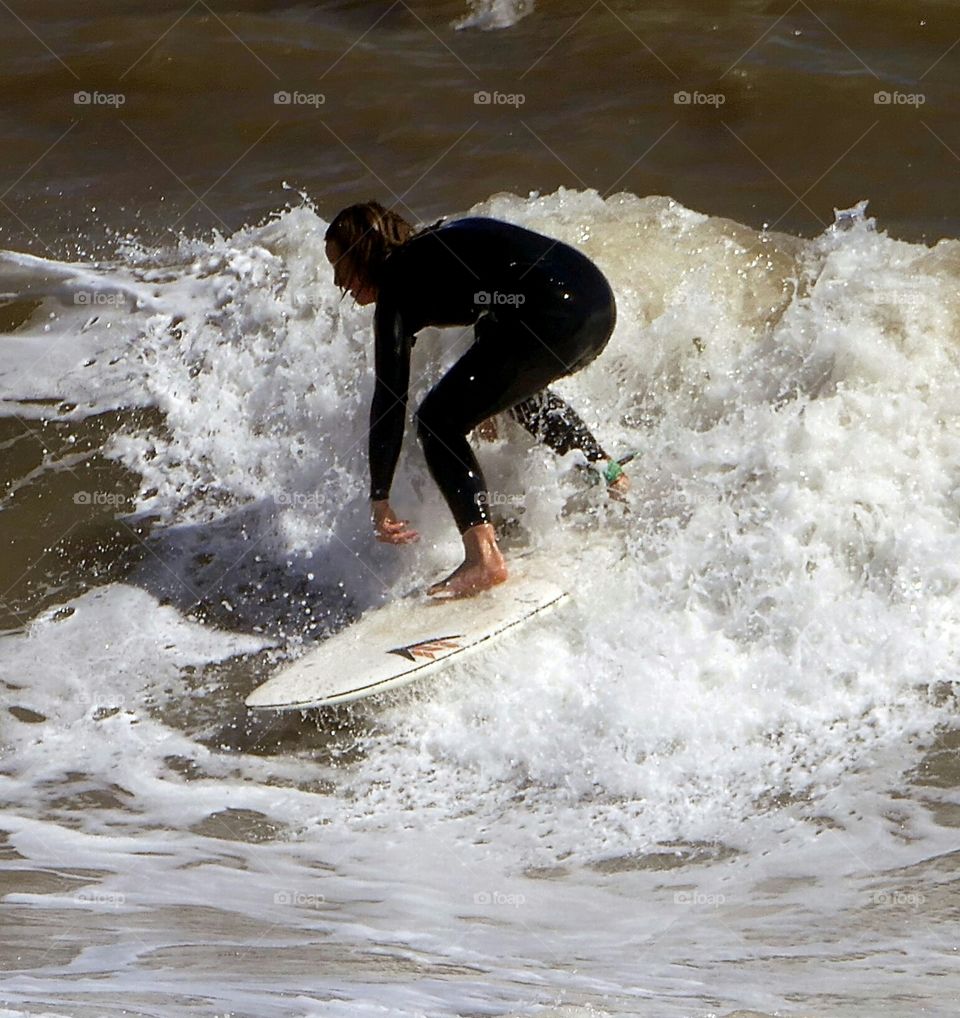 Surfing Brighton Beach.
