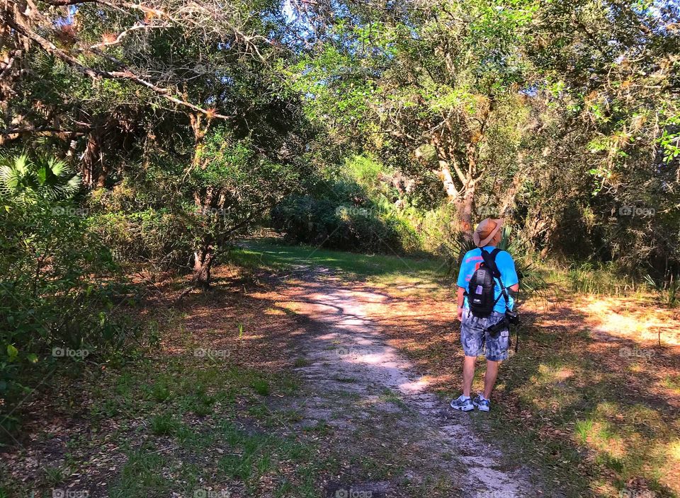 Hiker enjoying his natural surroundings.