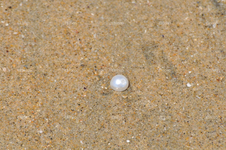 White pearl on the beach