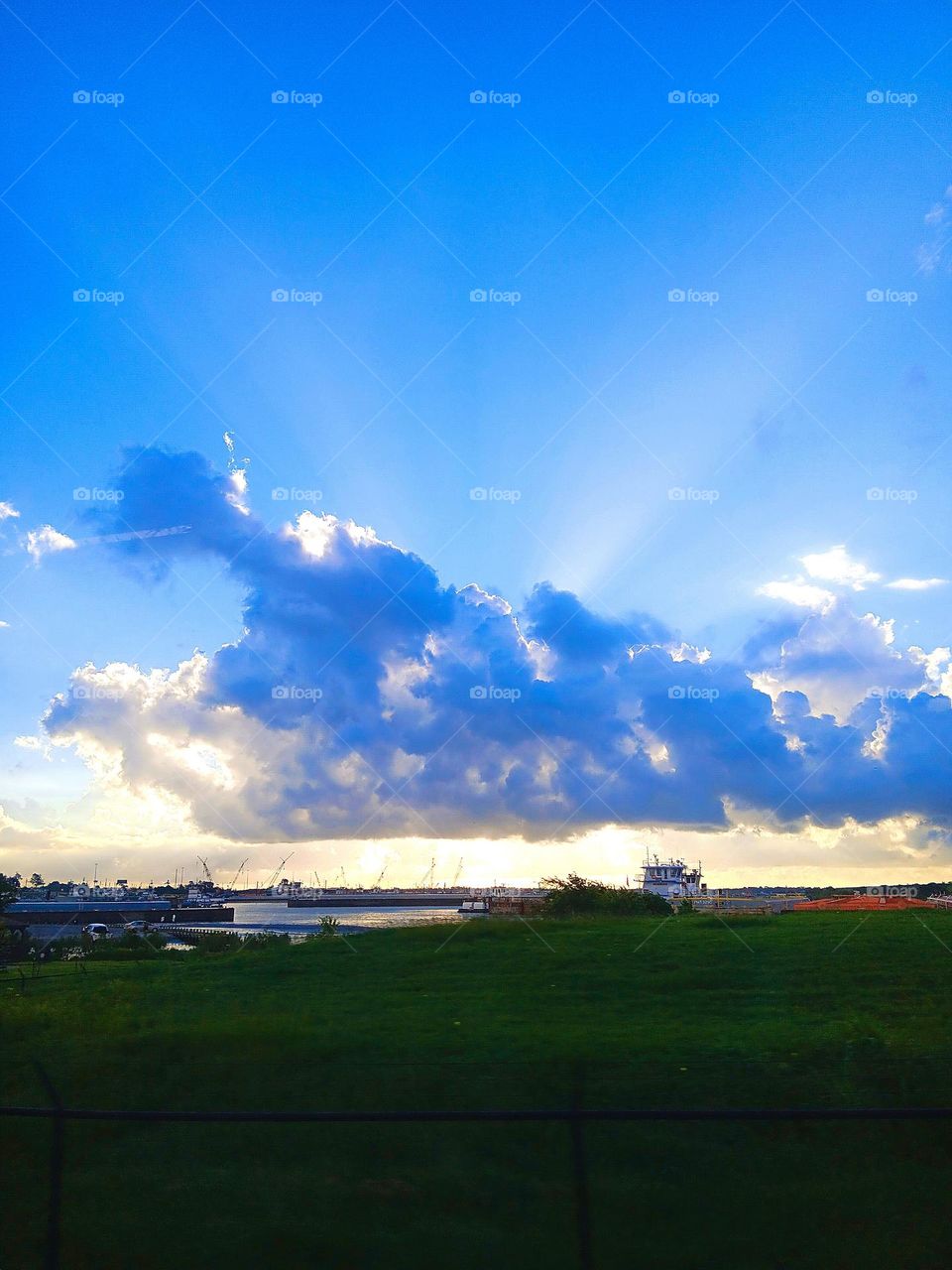 A big cloud in the sky with beautiful sunlight