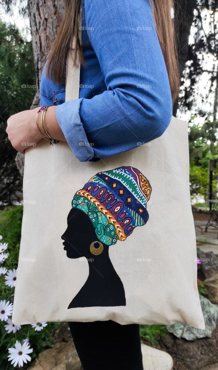 Hand painted canvas bag with handmade earring.