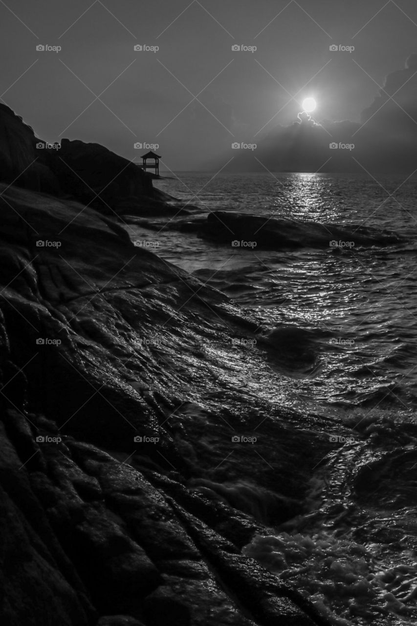 Beginning of Day light, captured this Coastal Sunrise with sharp details while the waves struck the Rocky Shoreline.... Landscape and Seascapes.