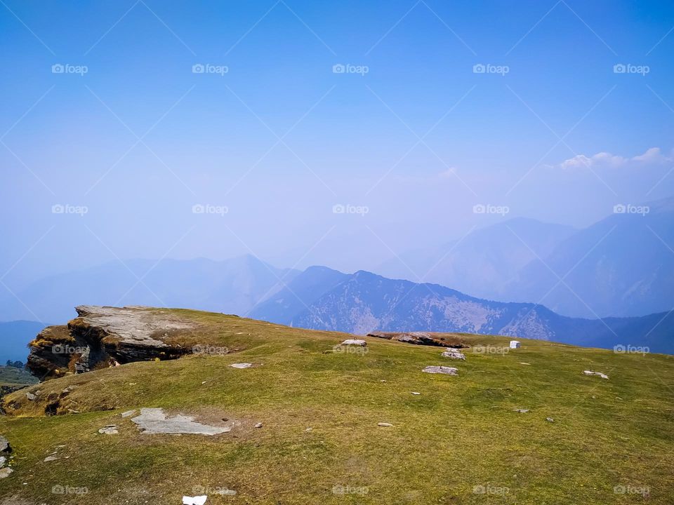 A amazing view of mountain landscape with sky and clouds