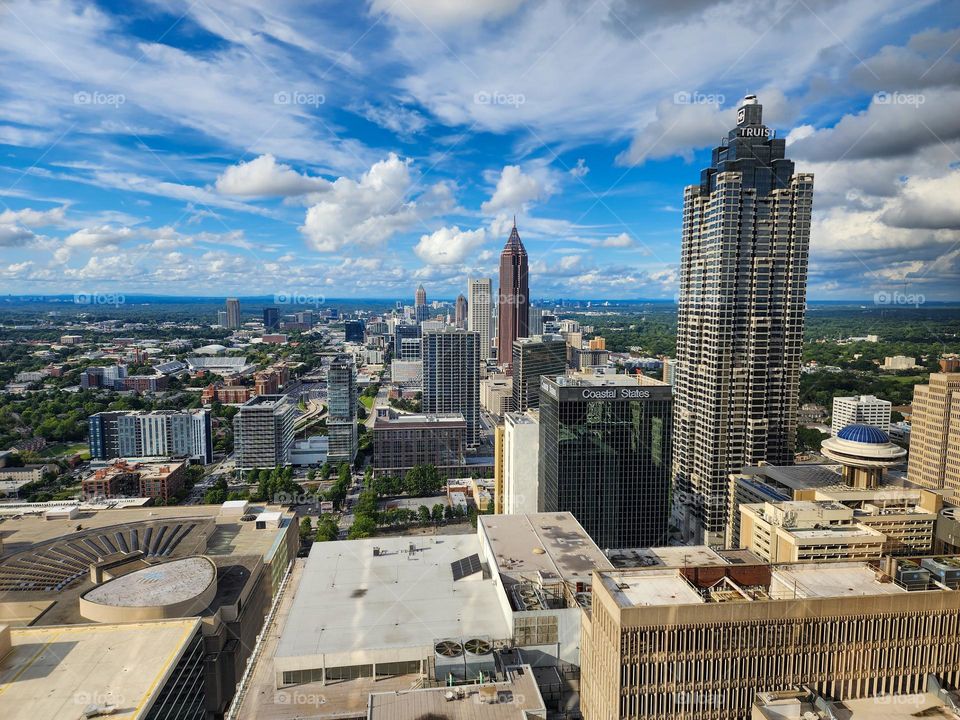 Downtown Atlanta and some of the skylines skyscrapers are visible on a beautiful summer day