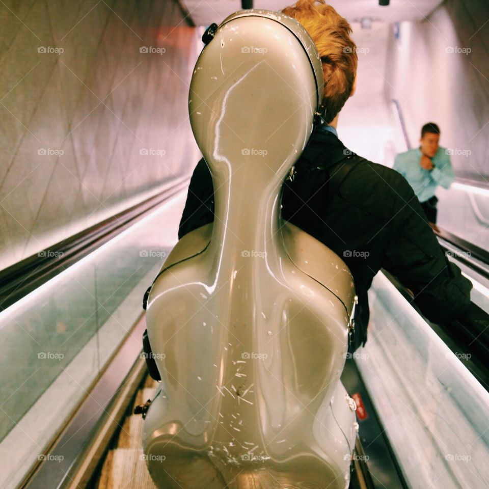 Cello player in Escalator 