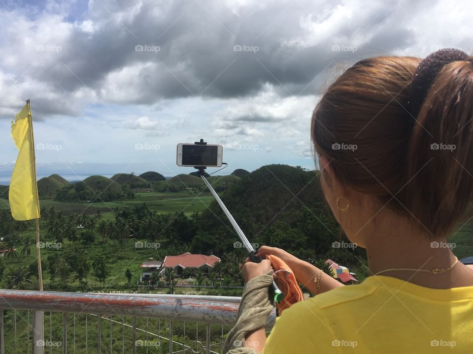 A girl snapping a photo