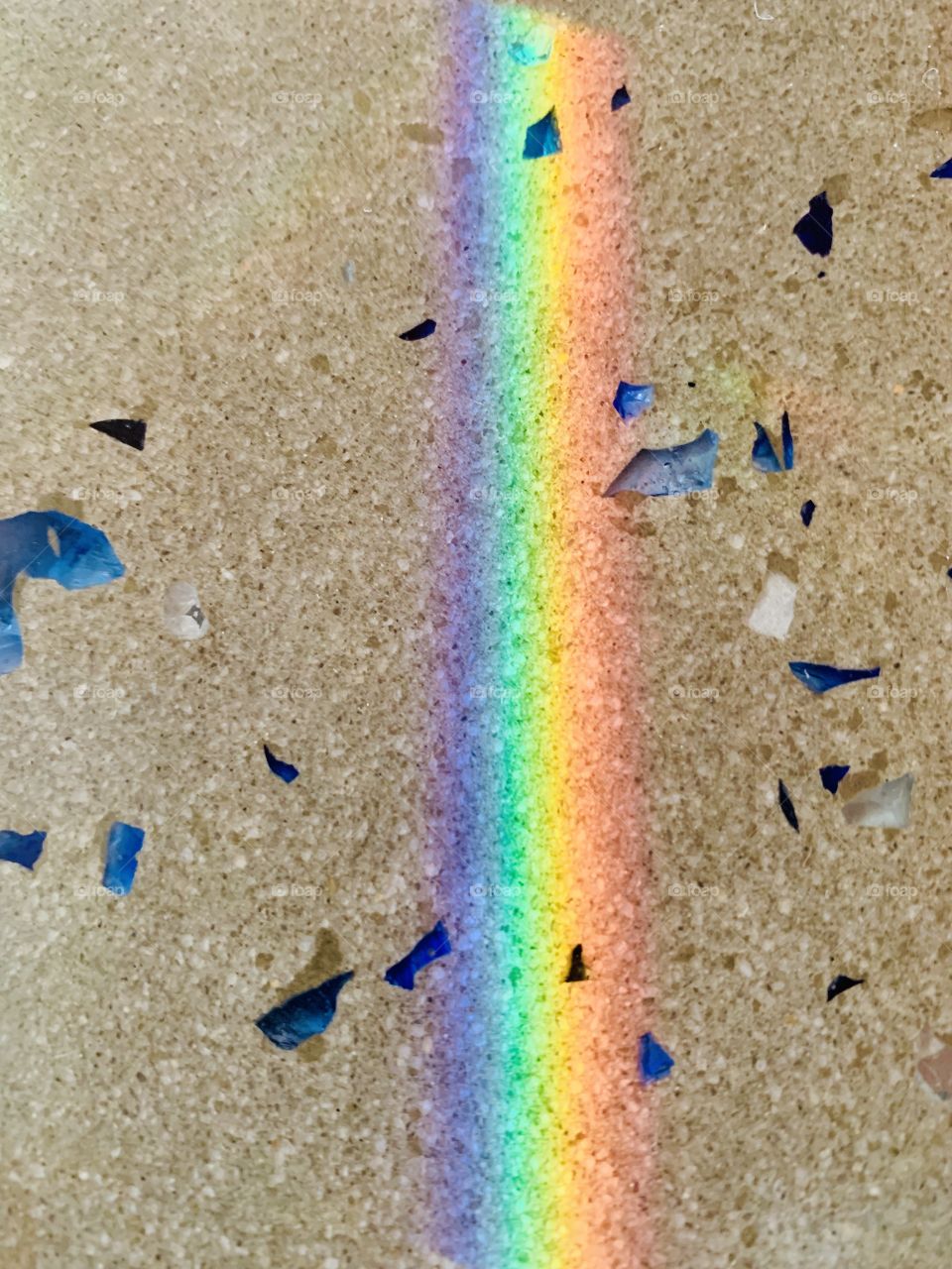 Colorful rainbow on table