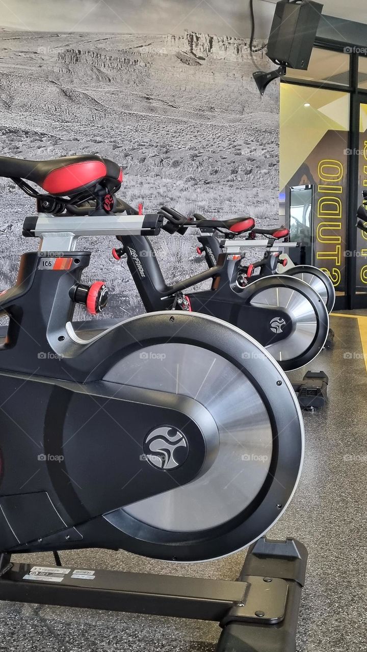 spinning bicycles in a gym studio