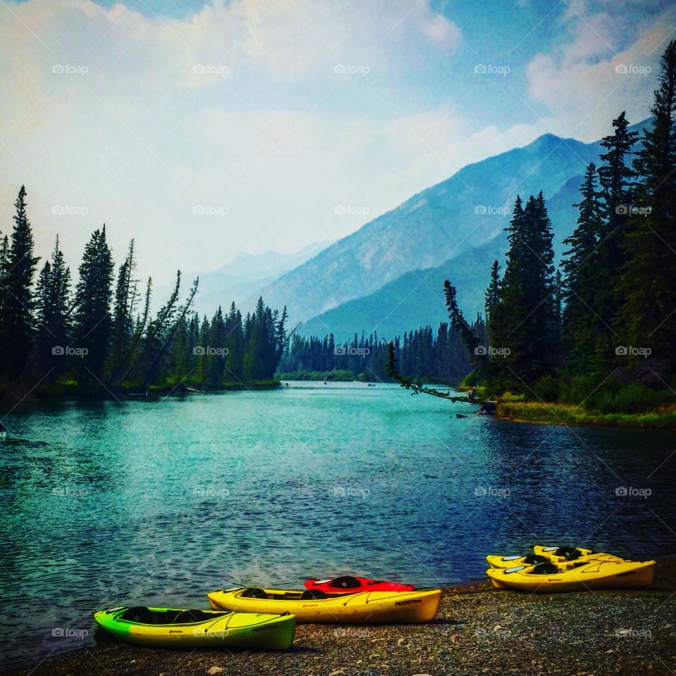 Canoes by the lake in Banff