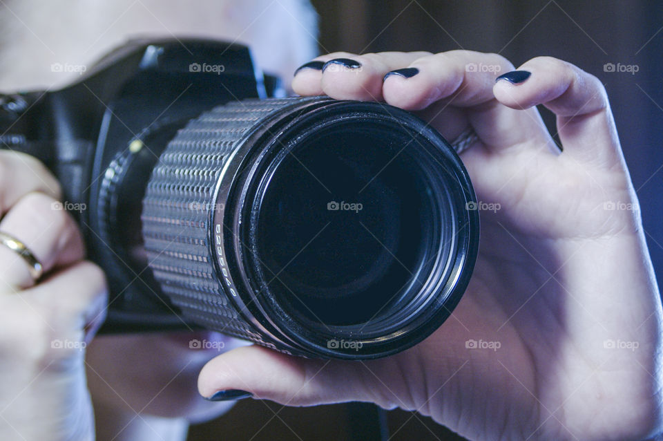 Camera in the hands of a photographer