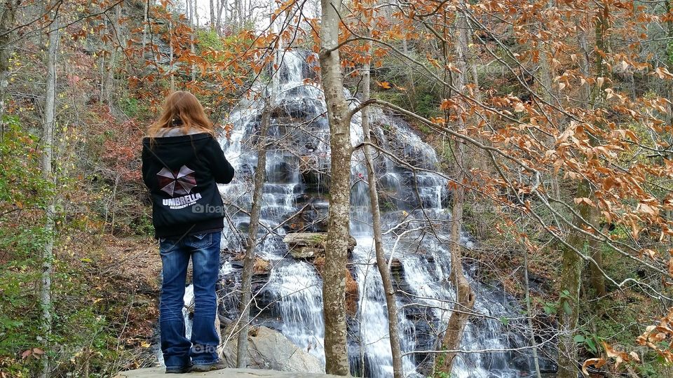 young lady admiring Issaqueena falls in South Carolina