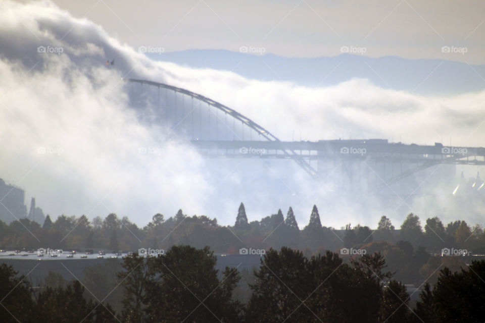 Fremont bridge and downtown Portland Oregon on a foggy morning 
