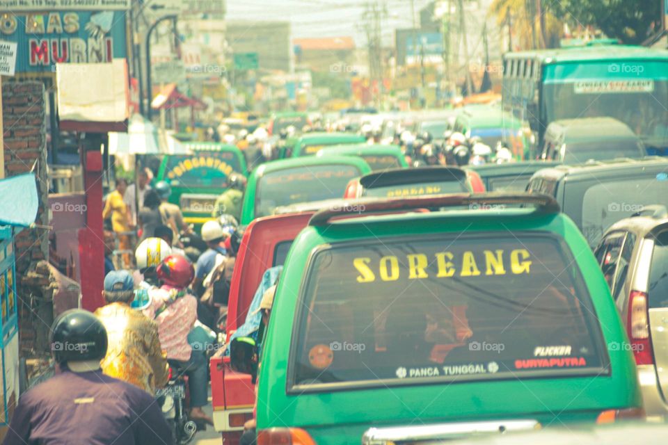 traffic jams in the city of Bandung, busy city transportation in the morning.