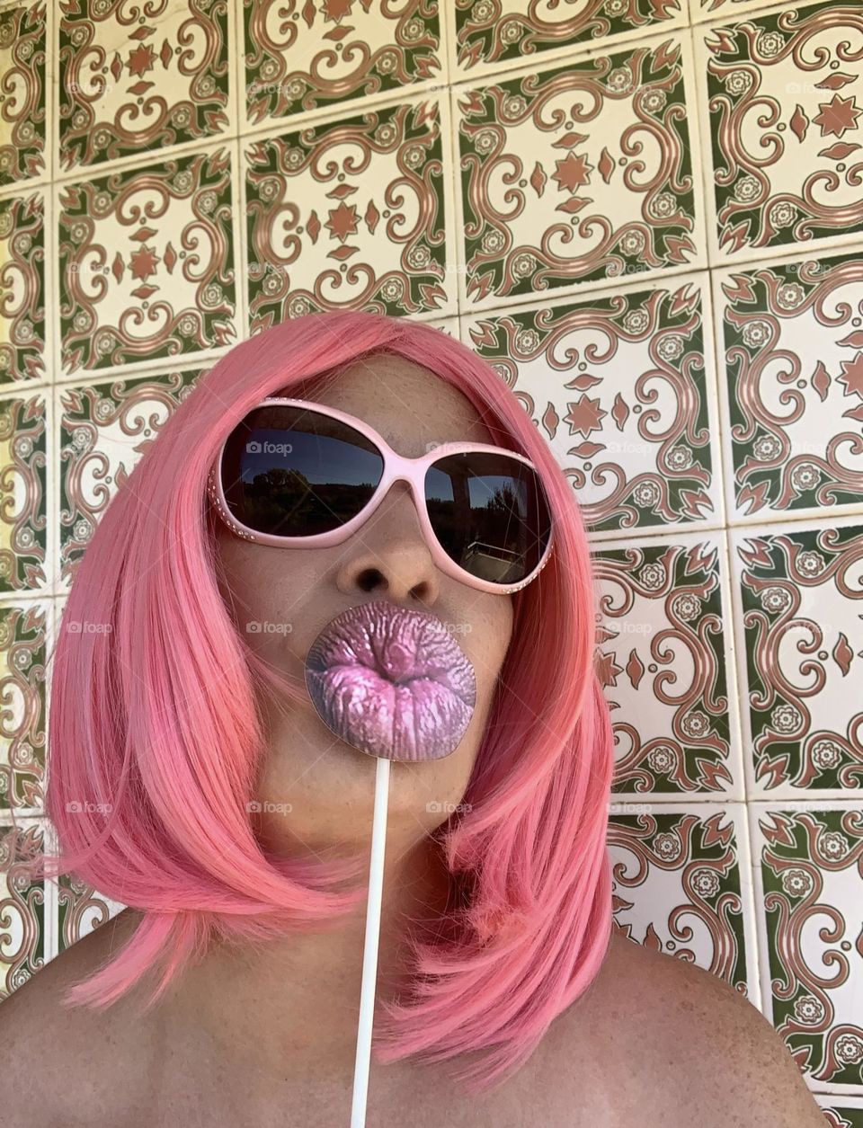 Barbie themed selfie with pink wig, sunglasses and fake lips