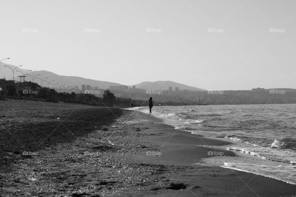 On the beach. Black and white on the beach