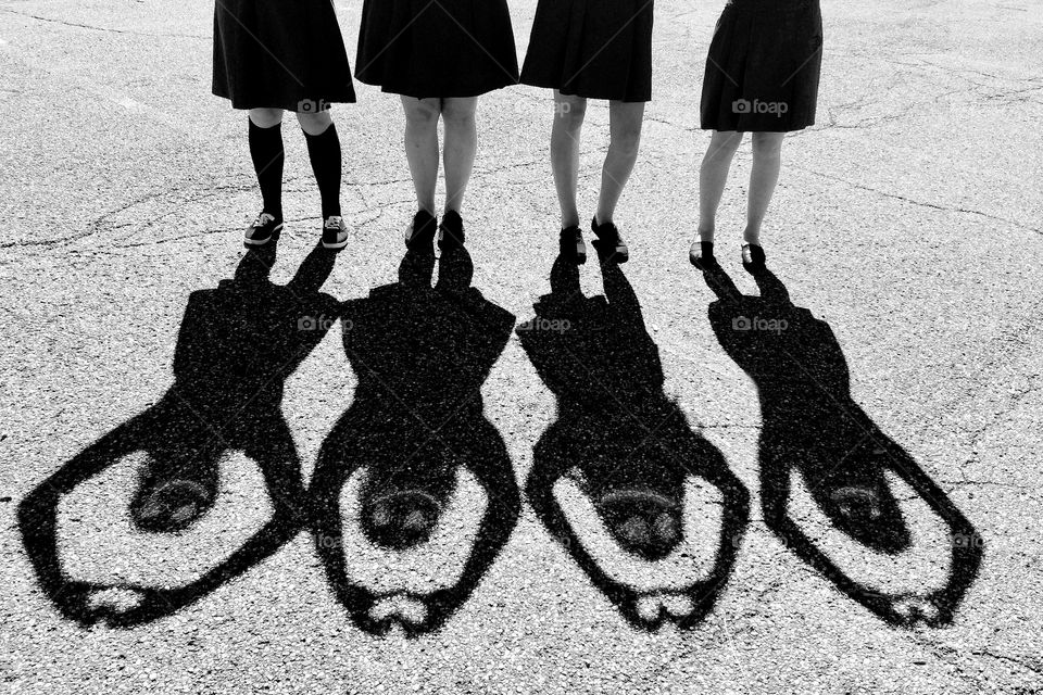 High school girls making shadows