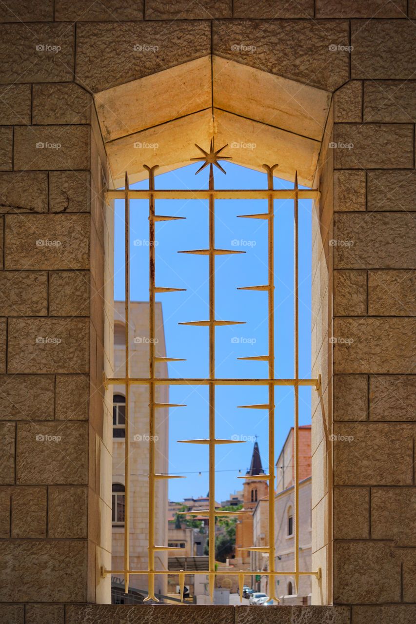 window of ancient church in Israel, christian pilgrimage destination