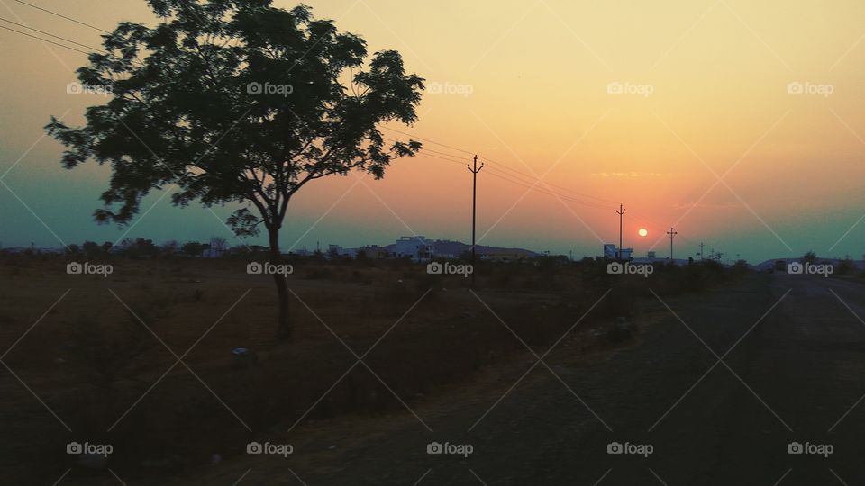 Empty street during sunset