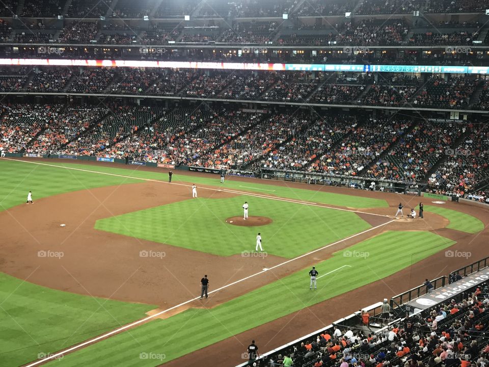Cheering on our favorite baseball team from our box seats! Go Houston Astro’s!!