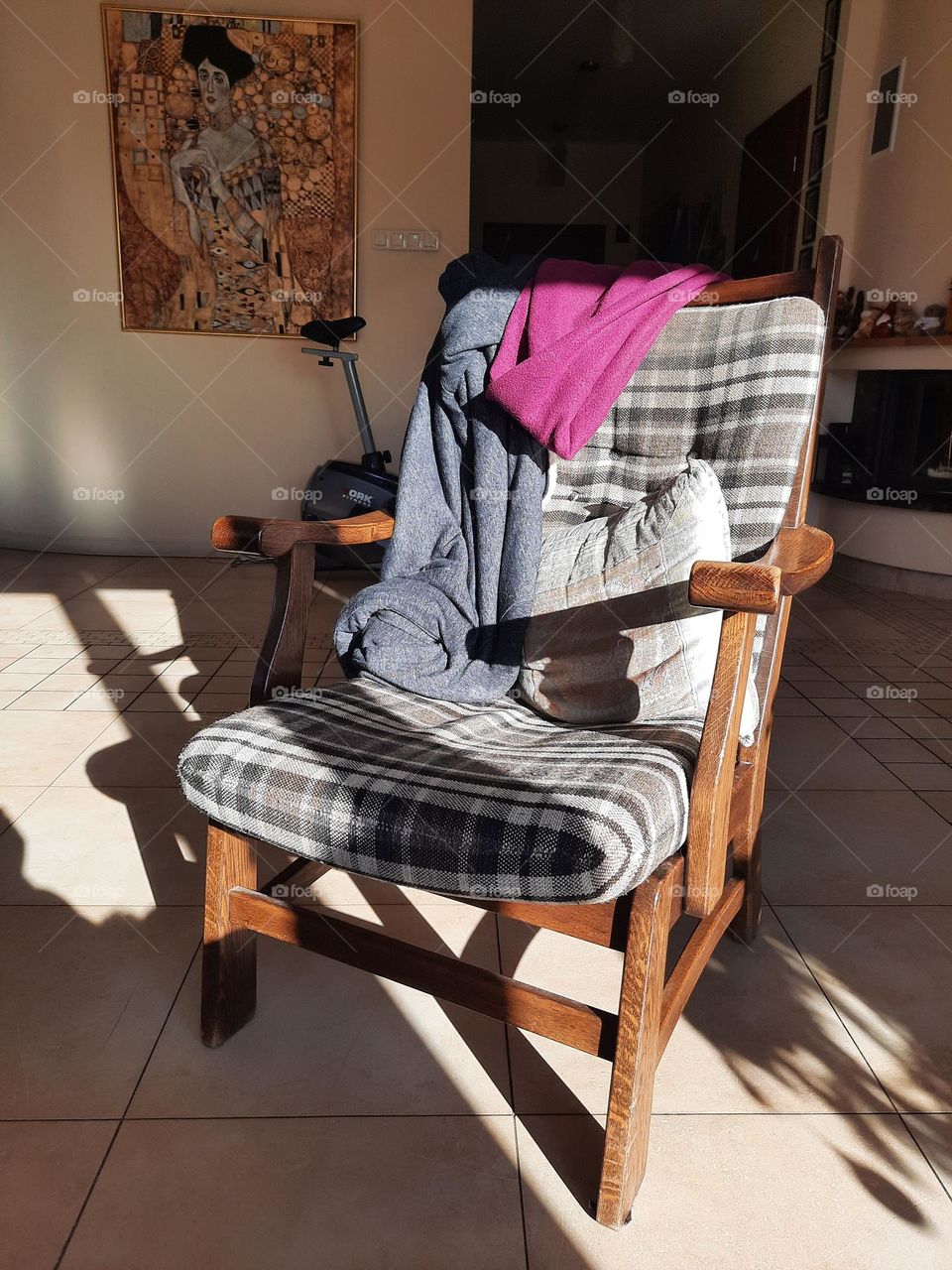 wooden armchair in sunshine