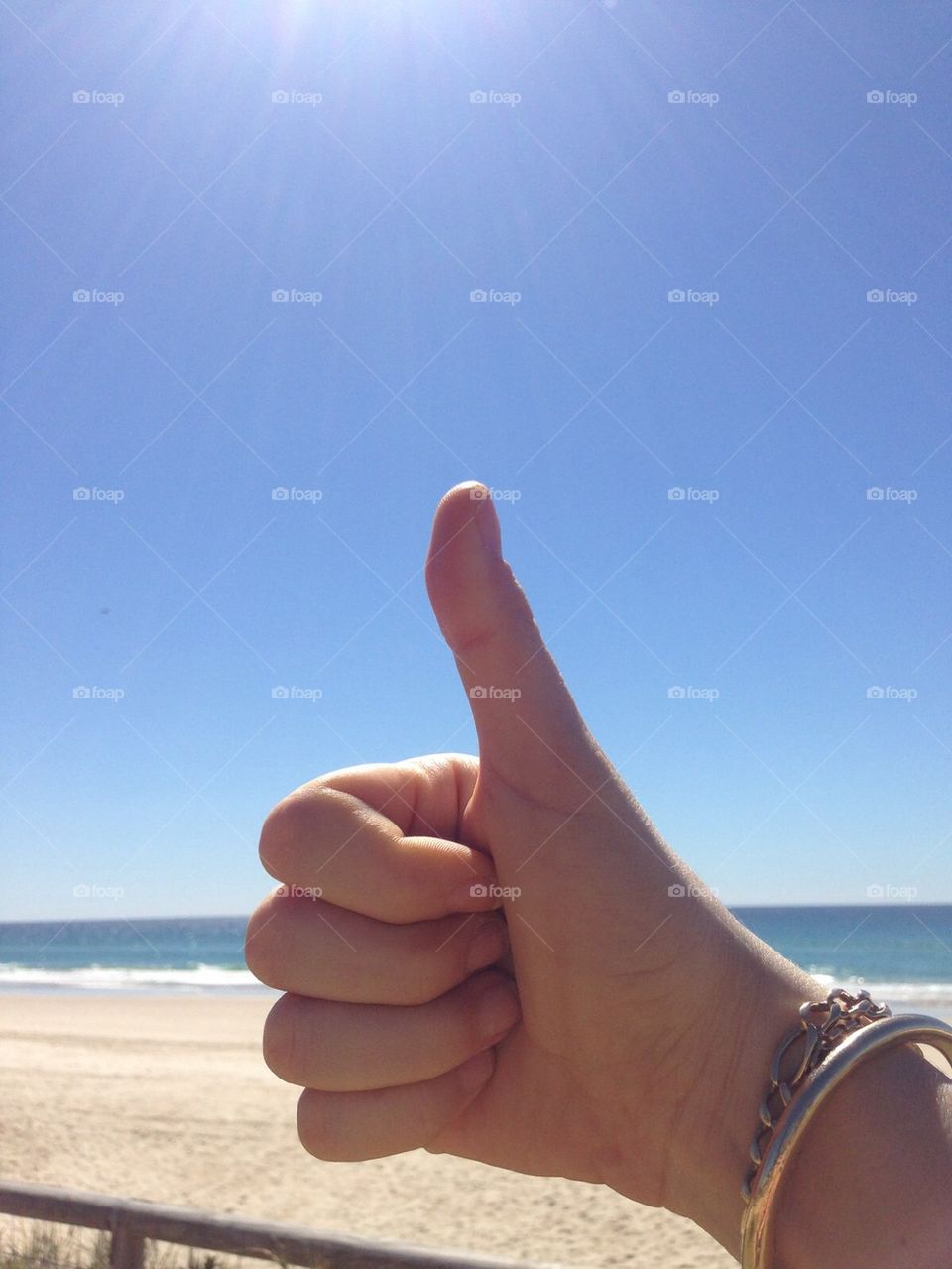 Thumbs up at the beach